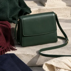 Pine Mini Satchel, pine: small structured pine-green satchel with clean flap and slim shoulder strap
